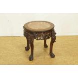 Wooden carved table with marble top, China ca. 1900, h. 48, d. 46 cm. Hardhouten rijkgestoken