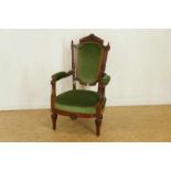 Mahonie damesfauteuil met snijwerk en gestoken kuif, 19e eeuw A mahogany ladies chair with carved