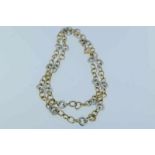 Bicolor gouden schakel collier gew. 30.6 gr. l. 56 cm.geh.585/000