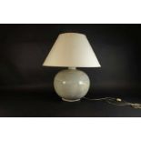 Celadon lampvoet met kap, h. 75 cm. A celadon lampbase with cap, h. 75 cm.