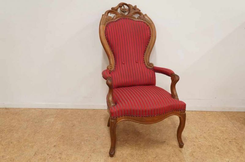 Eiken voltaire bekleed met gestreepte stof, 19e eeuws An oak voltaire with striped upholstery,