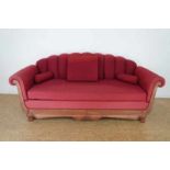 Deels mahonie bank met rode stof, h. 97, br. 220 cm. A mahogany sofa with red upholstery, h. 97 w.