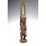 Dogon, staand figuur en Baule, houten masker.