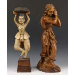 Twee houten sculpturen h. 50 cm.