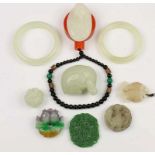 China, negen stuks jade en rood glazen ring 'bi' [10