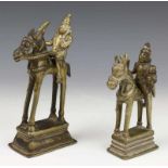 India, twee bronzen figuren te paard, ca. 1900; godinnen met kind en zwaard te paard h. 17 en 14 cm.