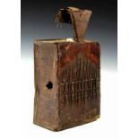 West Africa, thumb piano, sanza, with a metal resonance chamber, an old oil container. h. 33 cm. [1]