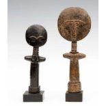 Ghana, Ashanti, two wooden dolls, akua ba; one with three glass beads strings, the other painted