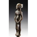 DRC., Luba (?), wooden staff decorated with standing female figure with black-brown patina. h. 76