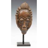 Ivory Coast, Baule, facemask, with elaborate hairdress, high forehead, small goatee and facial