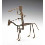 Mali, Dogon, metal sculpture of figure on horse, carrying a spear. br. 28 cm. [1]