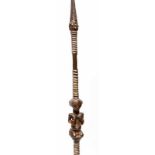 DRC., Luba, ceremonial spear, with carved wooden seated figure in the middle, with hands on her
