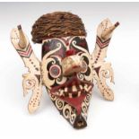 Borneo, Dayak, hudoq mask, with protruding nose and open mouth, attached ears, rotan headdress and