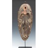 PNG, Middle Sepik, Iatmul, mask, with wooden protruding nose in form of bird beak, eyes with shells,