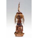 DRC., Songhe-Tetela, half figure, the face with pointed chin, broad mouth, oval eyes and hair carved