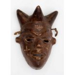 DRC., Pende, miniature mask, with headdress in four cones, cross-scarification on the cheeks and