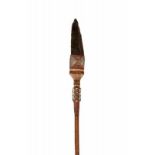 Admirality Islands, spear; high wooden hilt with a bound obsidian stone point, set in a widening