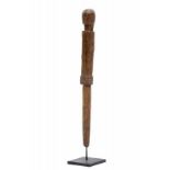 Central Timor, Belu, ancestral pole, aitos, the rectangular elongated body on a round shaft, the
