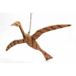 Mentawei Islands, wooden sculpture of a bird in flight, with the lower part of the bird painted in