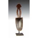 DRC., Ubangi, wooden spoon, with large head and open worked curved handle ending. With brown black