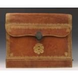 Red leather briefcase with decoration and coat of arms in gold leaf. The back as writing cassette.