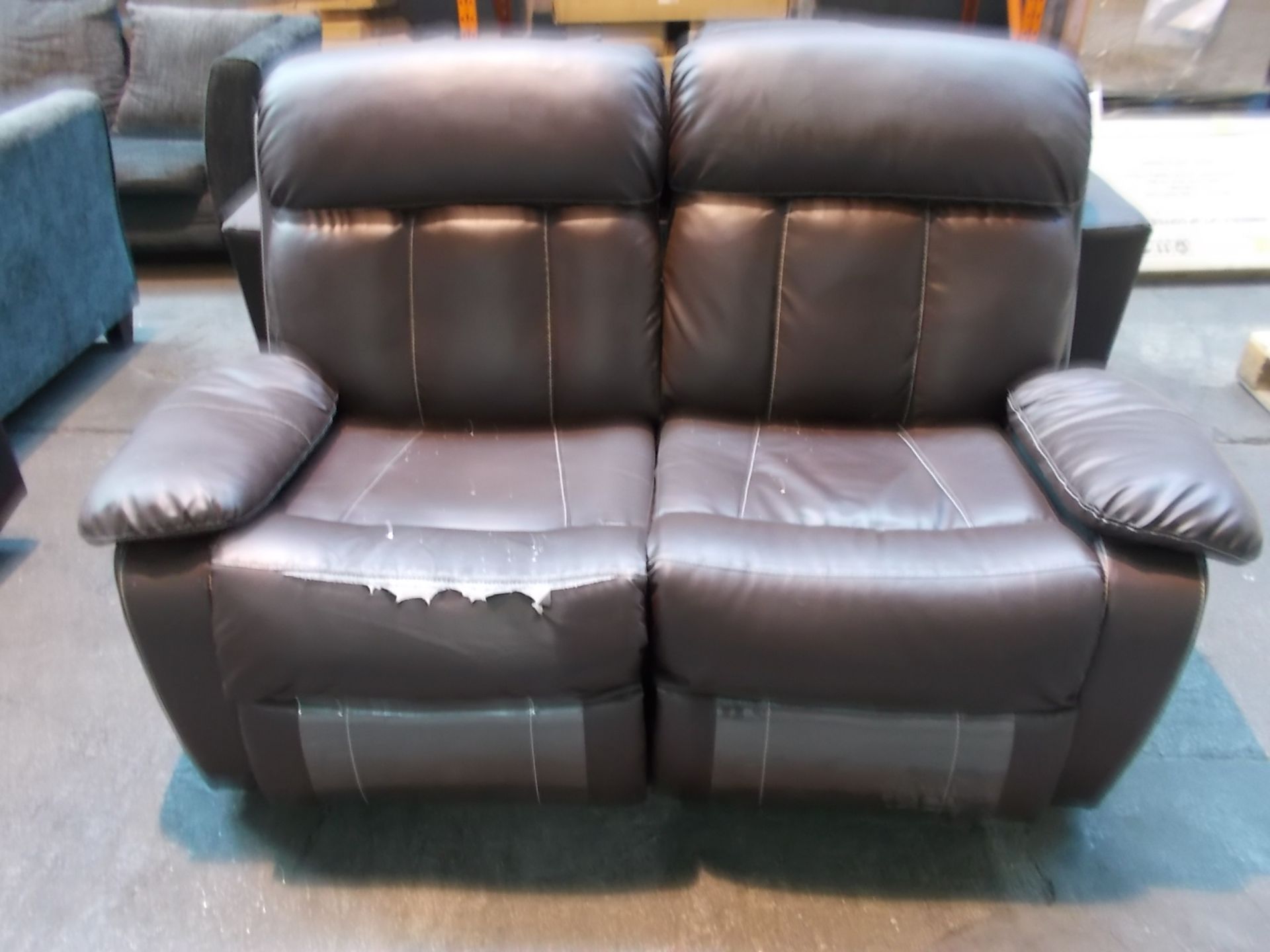 1 BROWN FAUX LEATHER 2STR RELINING SOFA (DAMAGED)