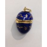 Fabergé-Ei-Anhänger, 18 kt. Gelbgold, blau emailliert mit ornament. Verzierungen. Exempl. 22/500.