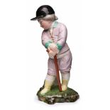 Kl. Jockey, Höchst 18. Jh. Entw.: Joh. Peter Melchior. Standfigur in Reit- dress m. Kappe, sich