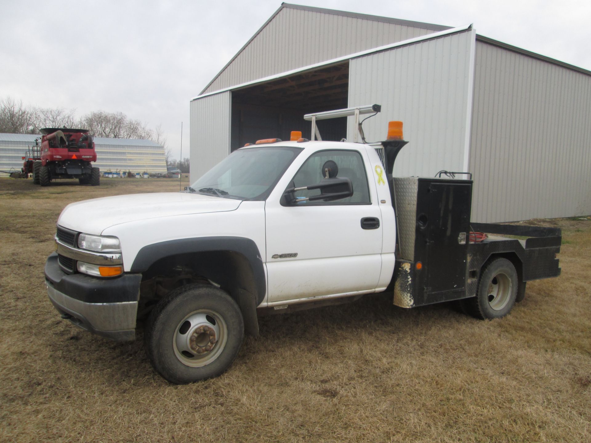 2002 Chev 3500 1T dually w/ 8-1/2' service deck, 2WD, showing 96,416 km, tool boxes, reg cab, 6 L,