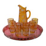 A Bohemian amber-flashed and clear glass part lemonade set, late 19th century