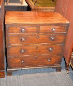 A George III mahogany chest of drawers, with later turned handles, 80cm wide