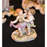 A Meissen group of two putti dancing, blue crossed swords mark, circa 1880