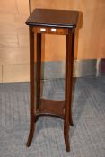 An Edwardian mahogany and line inlaid plant stand