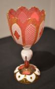 A Bohemian ruby-flashed and opaque-white overlay goblet vase