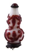 A Chinese Peking glass red overlay snuff bottle