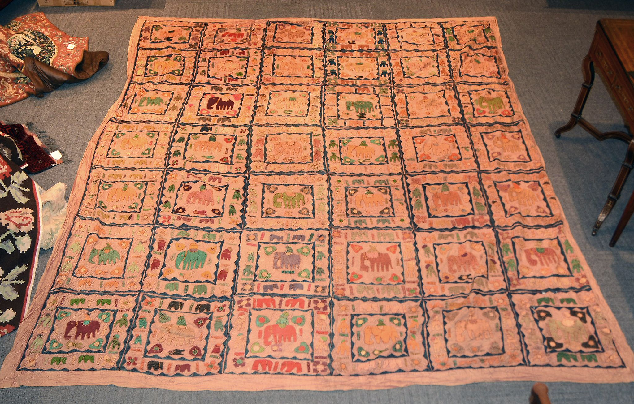 A modern Indian bedspread, with panels of elephants, approx 287cm x 245