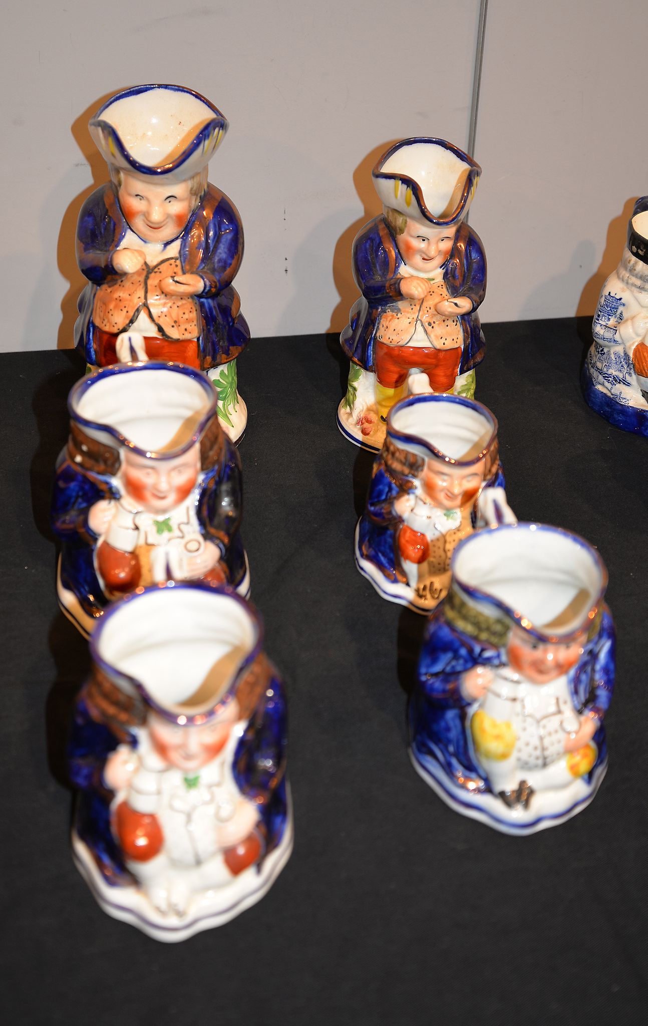 Six Staffordshire Toby jugs, including two 'snuff taker' examples