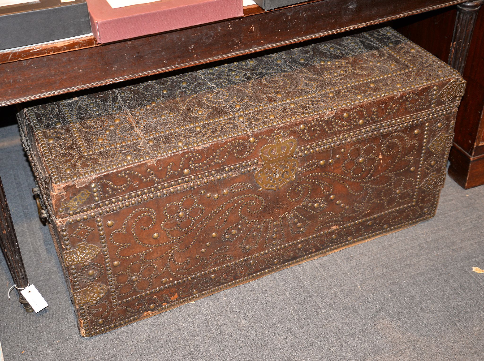 A leather bound and brass studded chest, first half 18th century, 51cm high