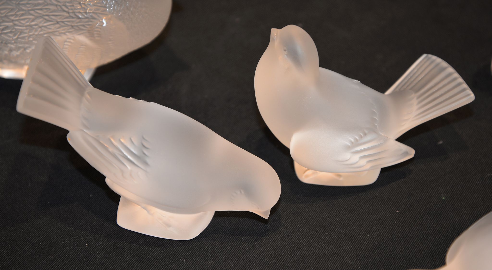 A pair of modern Lalique frosted glass models of birds, etched marks