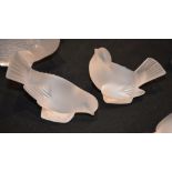 A pair of modern Lalique frosted glass models of birds, etched marks