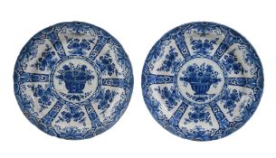 A pair of Dutch Delft blue and white plates, 1701-22