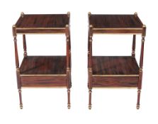 A pair of simulated rosewood and parcel gilt whatnots in Regency style