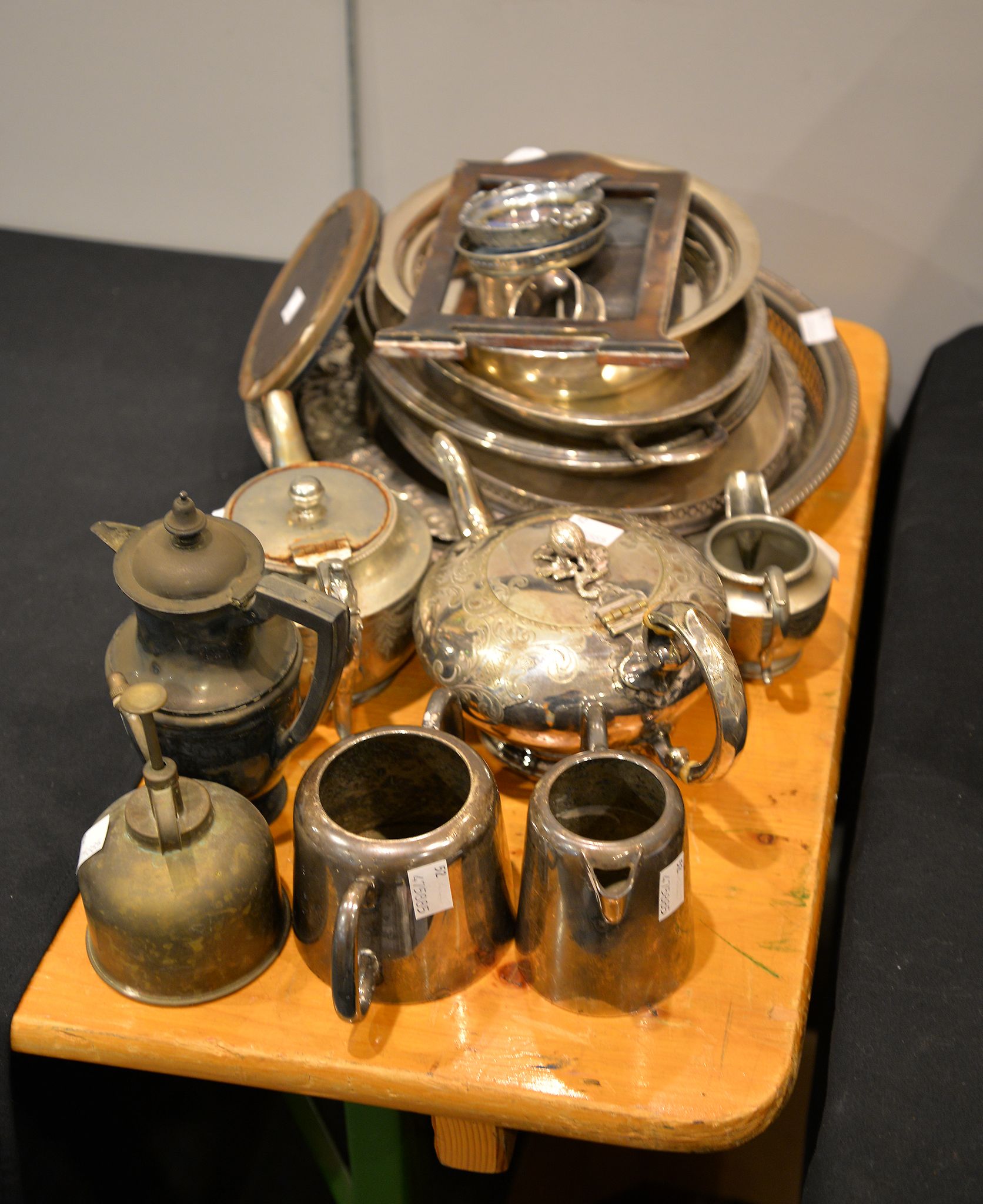 A Victorian plated and engraved teapot, a silver photograph frame