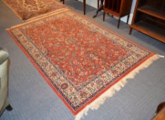 A Tabriz style pink ground rug, 235cm x 156cm