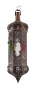 A pierced metal lantern in Islamic style, with coloured glass panels, 70cm high