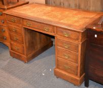 A late Victorian oak pedestal desk in George III style, 74cm high, 122cm wide