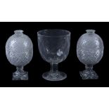 A pair of English cut-glass bonbonieres and covers in the Regency style