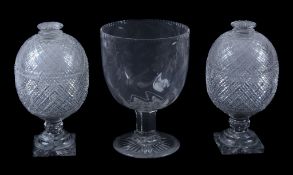 A pair of English cut-glass bonbonieres and covers in the Regency style