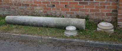 A stone composition column, 20th century, of Doric order, with circular capital