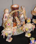 A late 19th century German porcelain centrepiece, lacking basket